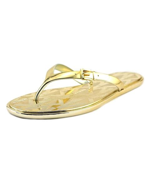 michael kors booties with gold heels|Michael Kors gold flip flops.